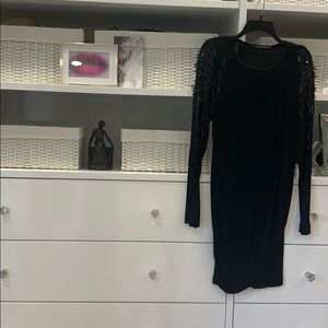 Mini black dress with sleeve accents